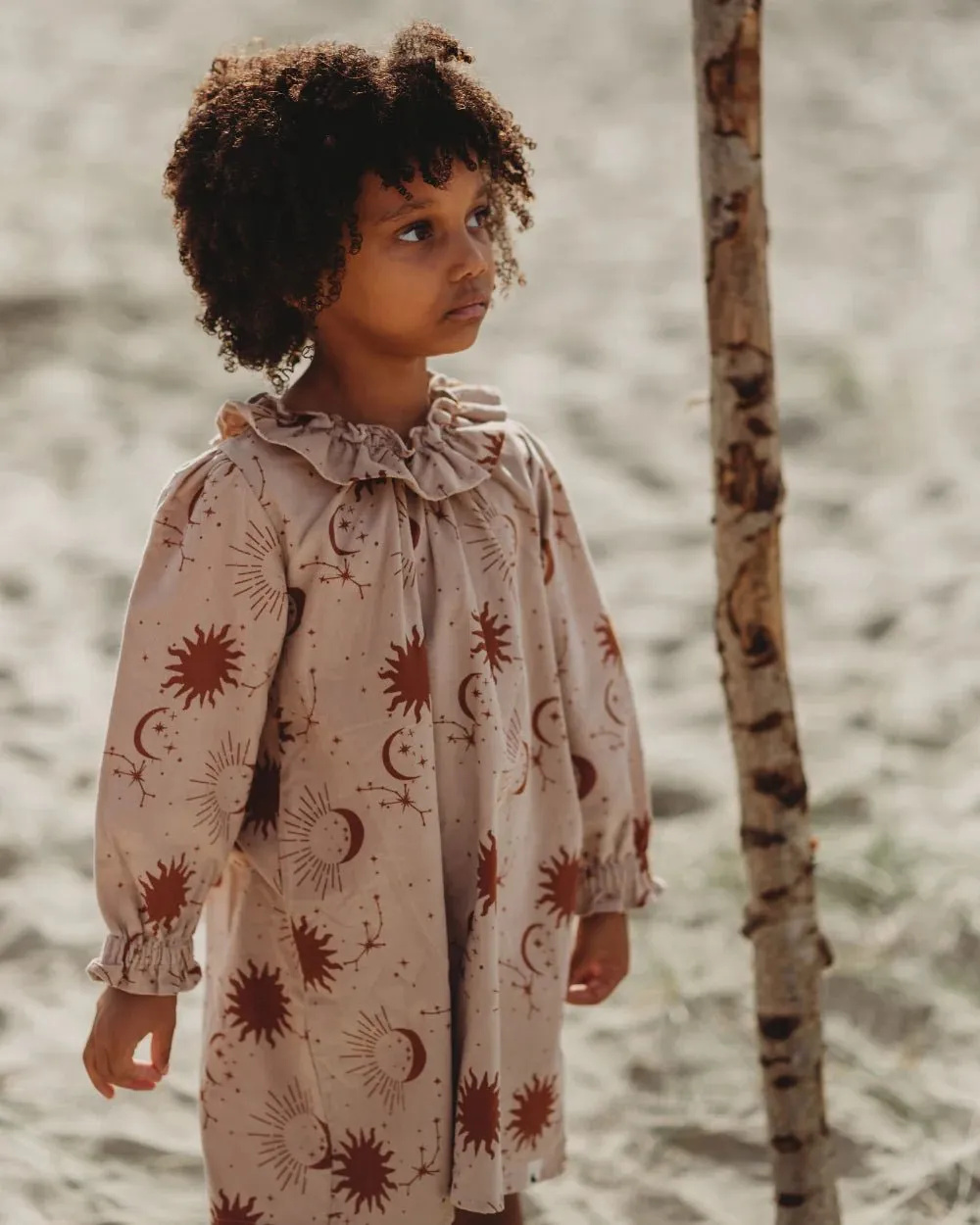 Turtledove London: Celestial Cord Long Sleeved Dress